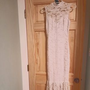 Long white lace wedding dress.Bebe.